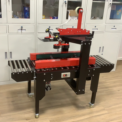 Elektrisch aangedreven semi-automatische behuizing kartonnen doos taping sealer met een enkel universele wiel