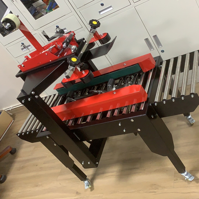 Elektrisch aangedreven semi-automatische behuizing kartonnen doos taping sealer met een enkel universele wiel